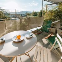 Terrasse avec vue centre-ville dans nos suites